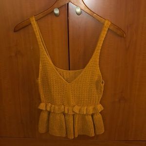 Super cute, super flirty cropped mustard top
